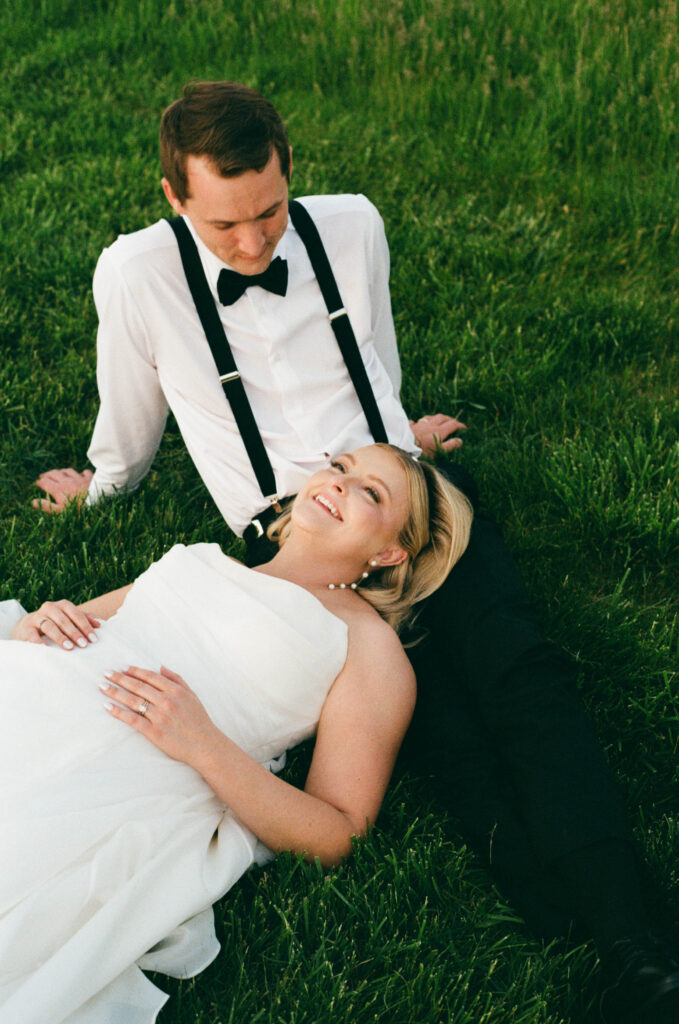 Couple sharing a quiet moment, documentary wedding photography capturing in-between moments.