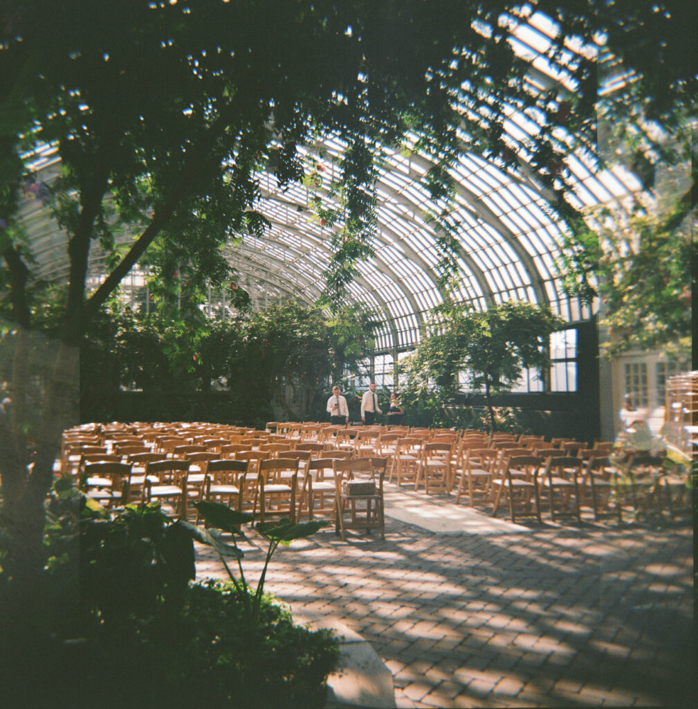 medium format film photo of ceremony prep at garfield park conservatory
