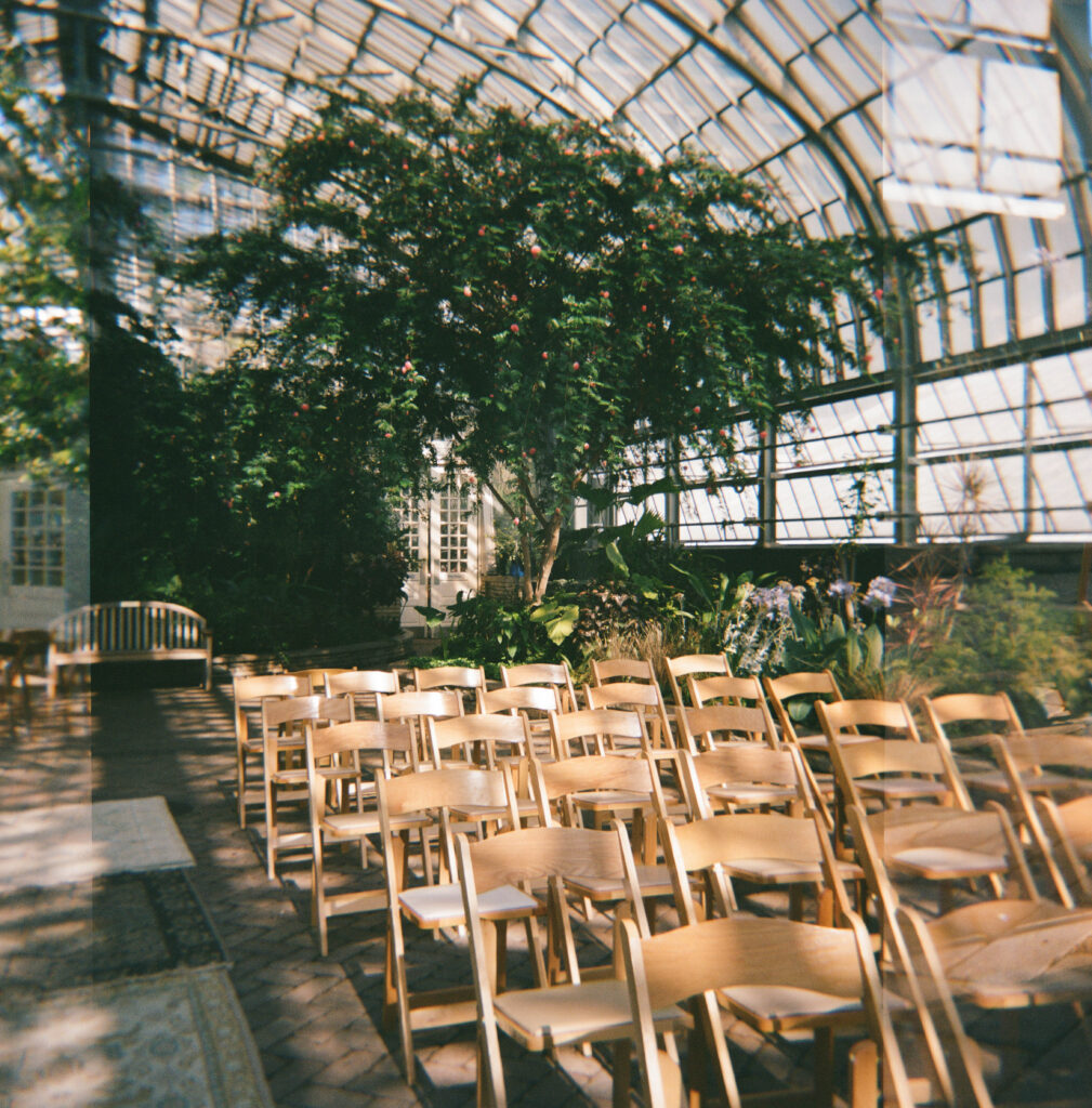 seating in ceremony location at garfield park conservatory on medium format film.