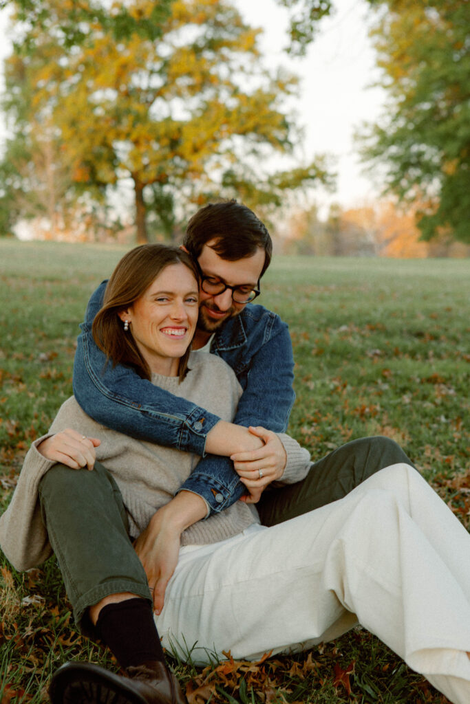 Couple photography in Columbia Missouri at Stephens Lake Park during autumn with colorful leaves