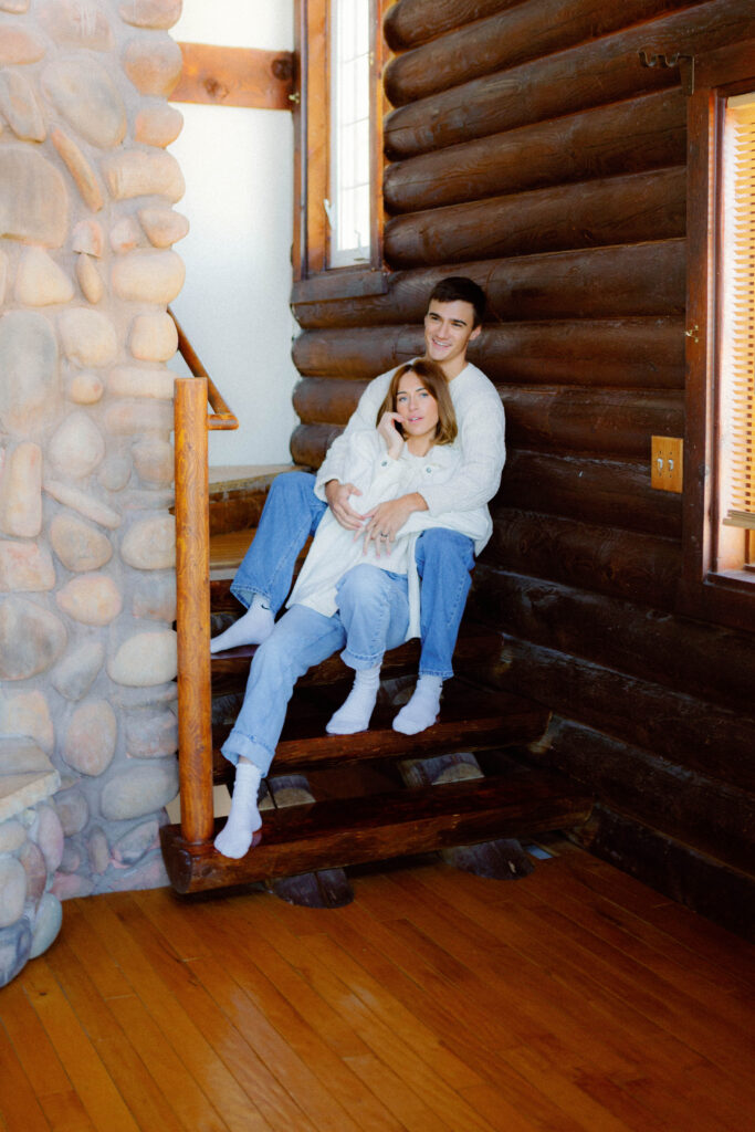 Editorial engagement photography capturing authentic connection at a Utah cabin