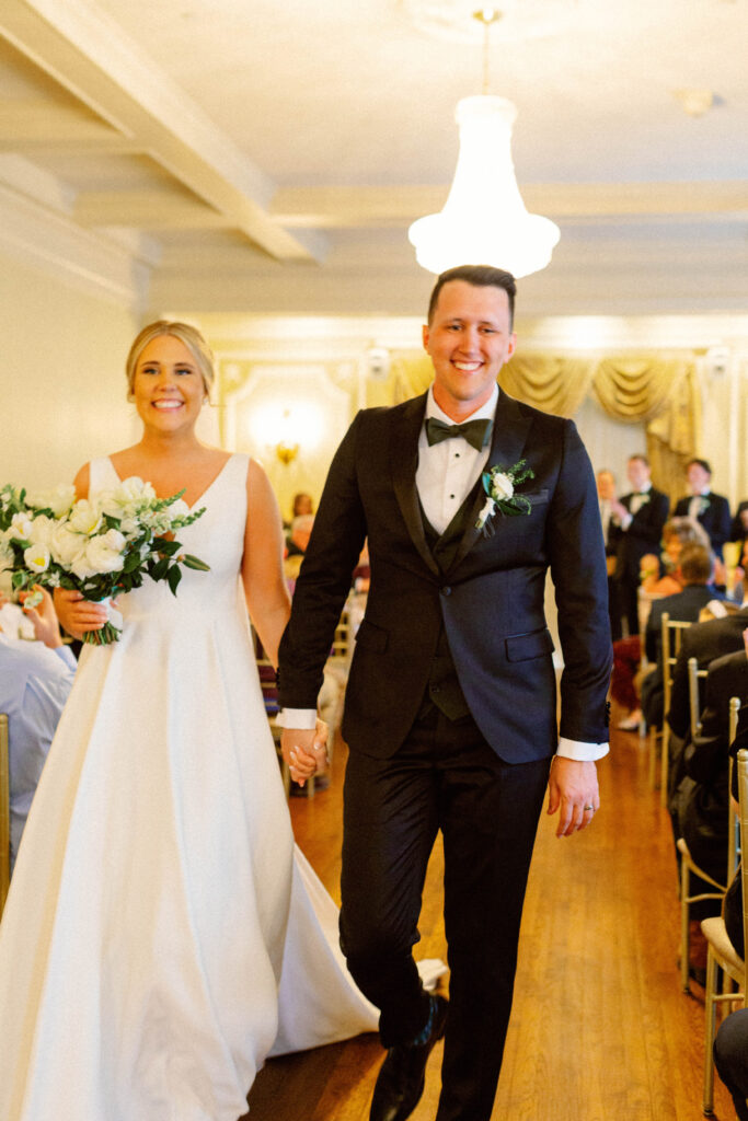 bride and groom celebrating after ceremony – presence-driven documentary wedding photography