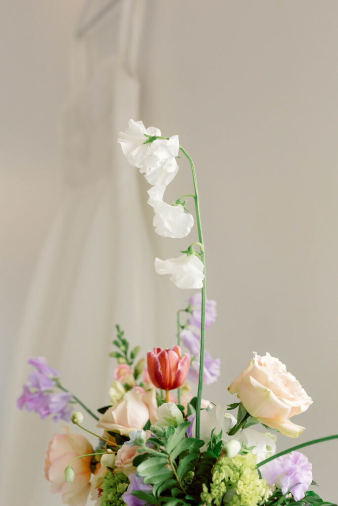 elegant reception table with The Cottage Rose floral design – artful wedding details with documentary approach