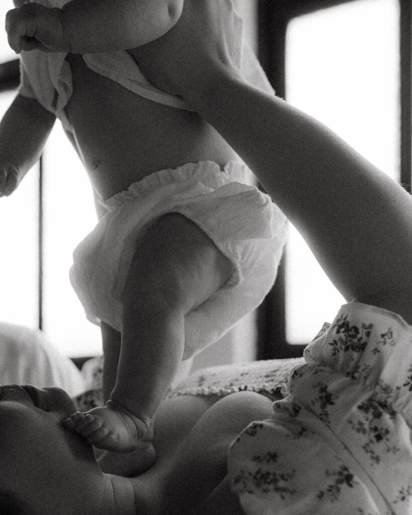 Emotional documentary newborn photography capturing connection between parents and 3-month-old
