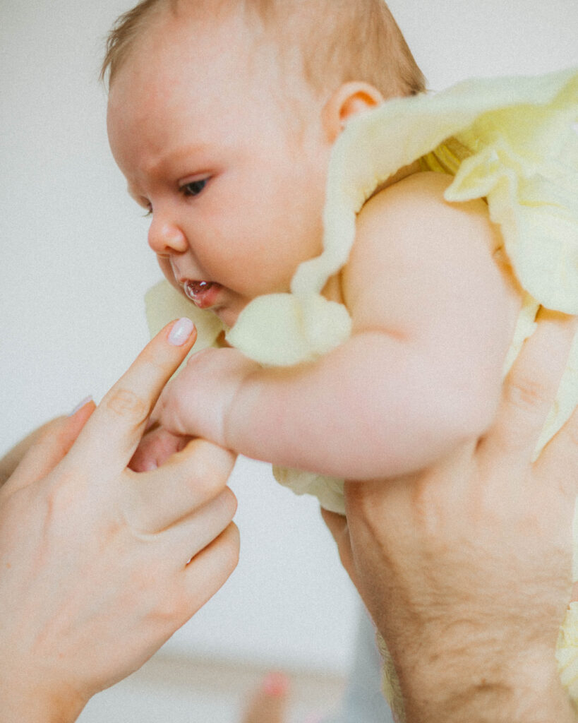 Studio newborn photography in Kansas City with 3-month portraits on digital and 35mm film