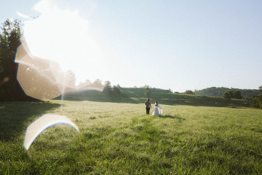 Columbia MO editorial elopement photography of the couple walking hand-in-hand