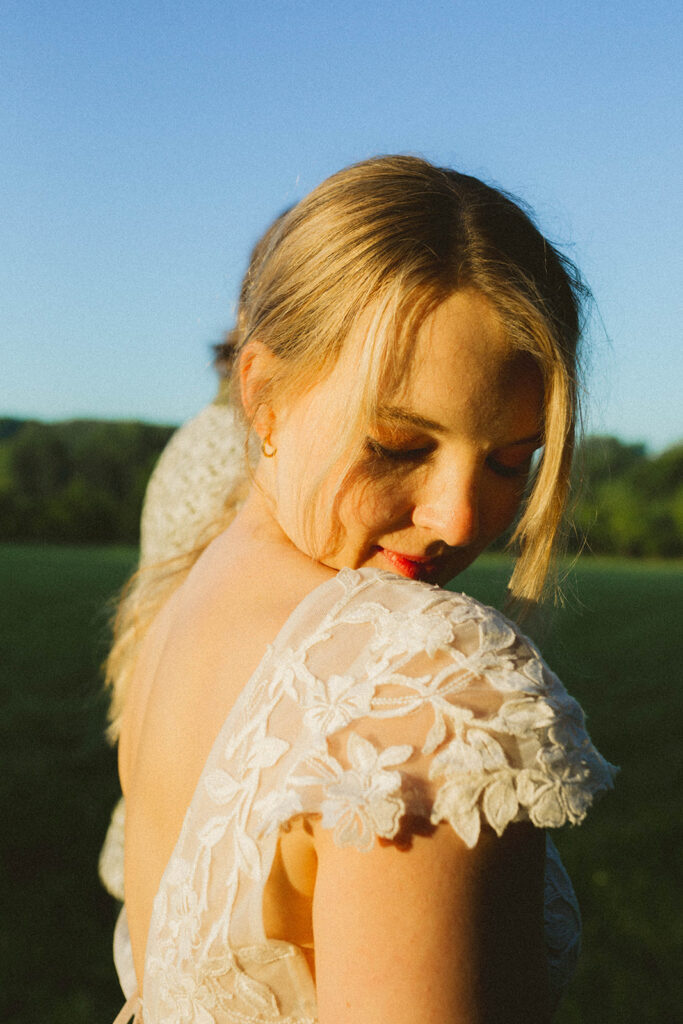 Columbia MO editorial elopement photography of the couple under blue skies and greenery